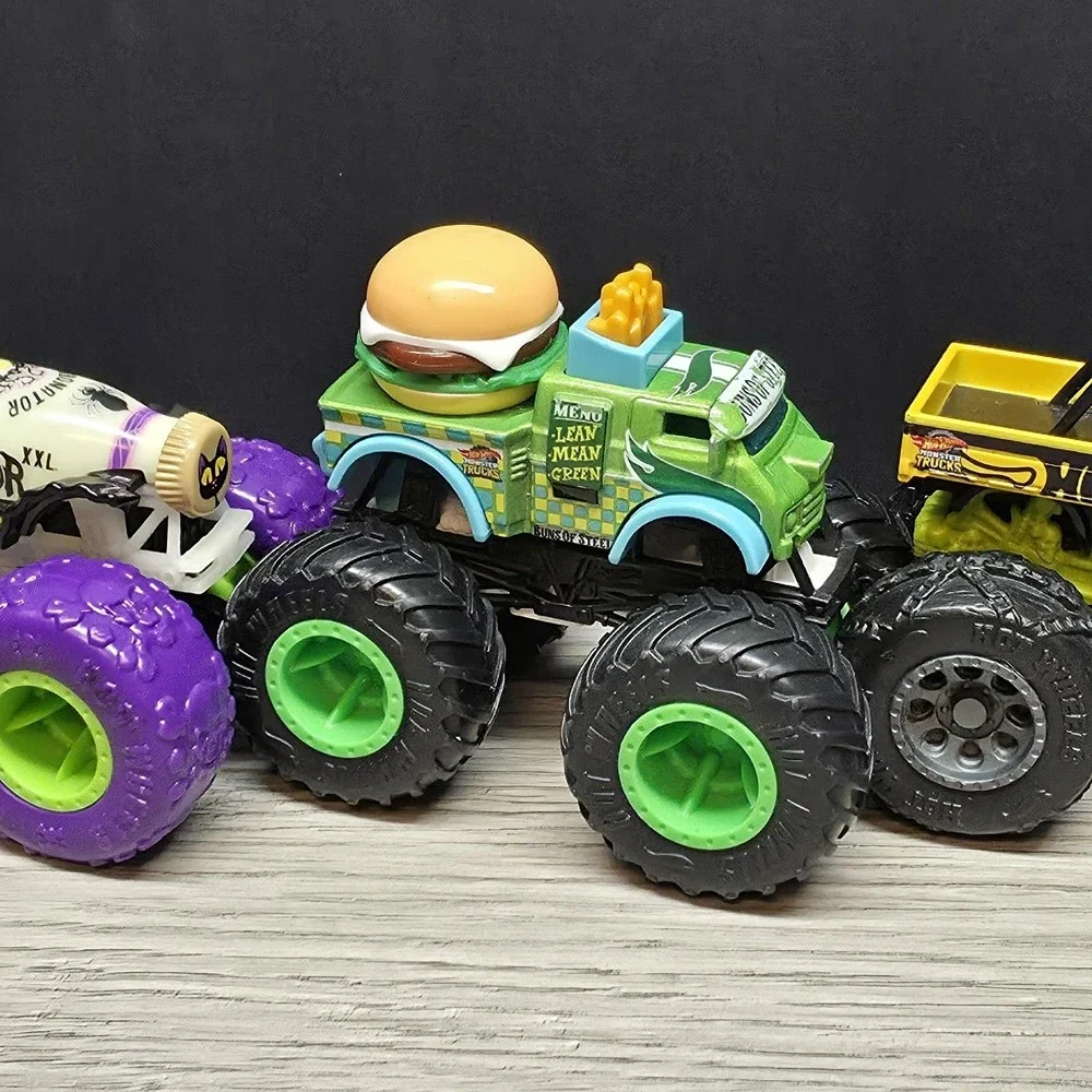 Hotwheels Monster Trucks Lot - Carbonator, Buns Of Steel, Unimog, And Tuk N Roll